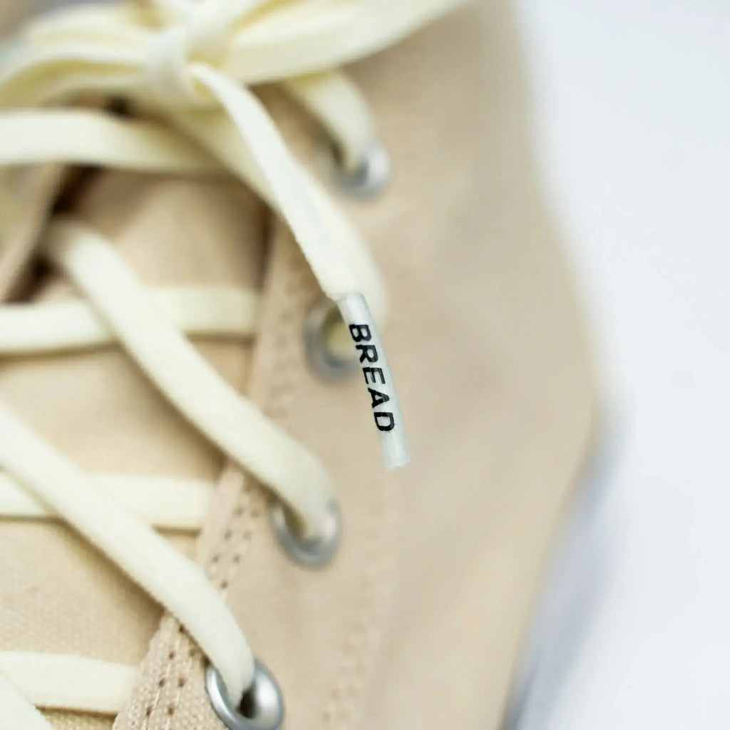 Elastic shoelaces in Luxe Creme color by Bread, featuring a sleek, smooth design suitable for enhancing footwear comfort.