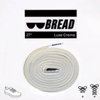 Elastic shoelaces in Luxe Creme by Bread, with a close-up of the flexible, stylish laces on a shoe.
