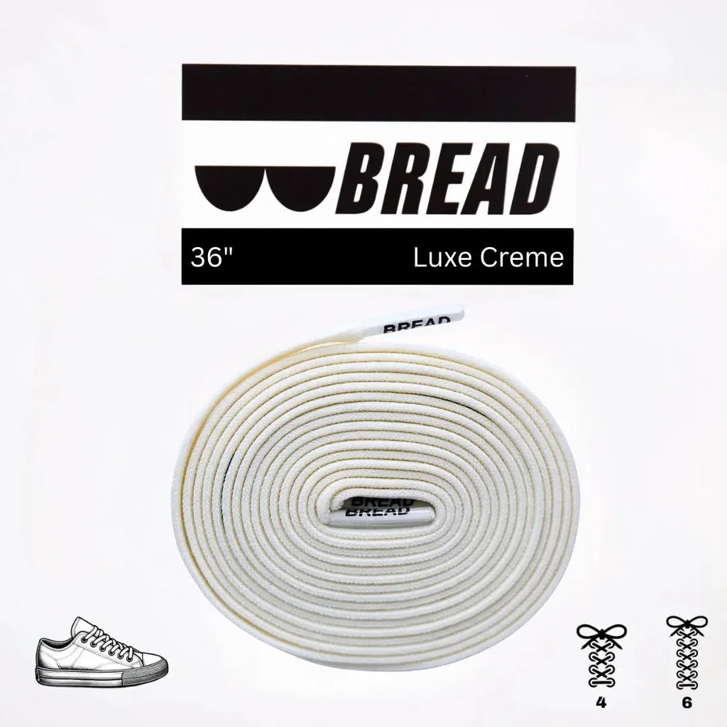 Elastic shoelace labeled Luxe Creme from Bread, featuring a smooth, creamy-colored design with flexible, durable material.