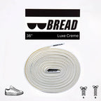 Elastic shoelace labeled Luxe Creme from Bread, featuring a smooth, creamy-colored design with flexible, durable material.