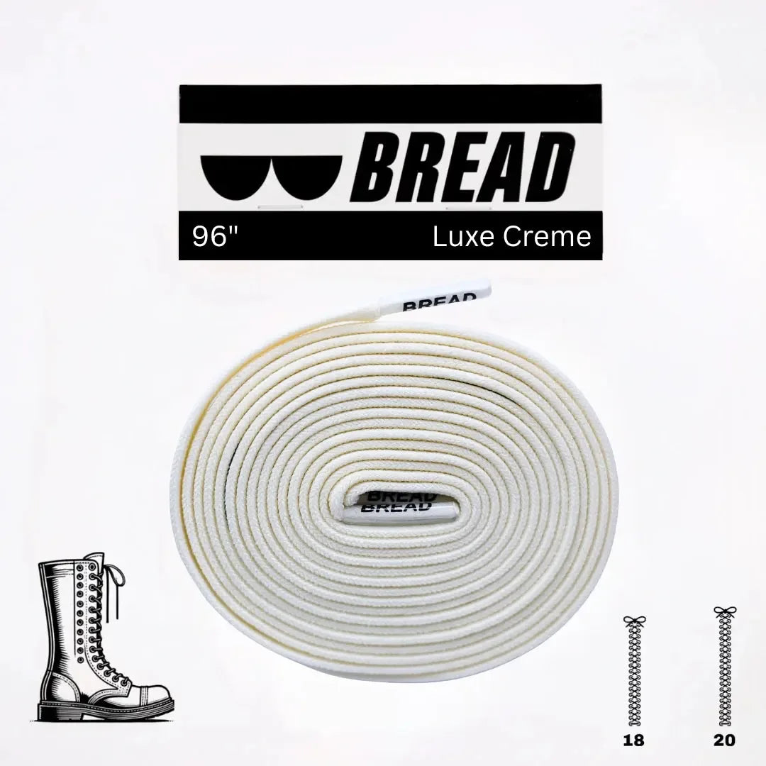 Elastic shoelaces in Luxe Creme color by Bread, showcasing their smooth texture and flexible fit on a pair of sneakers.