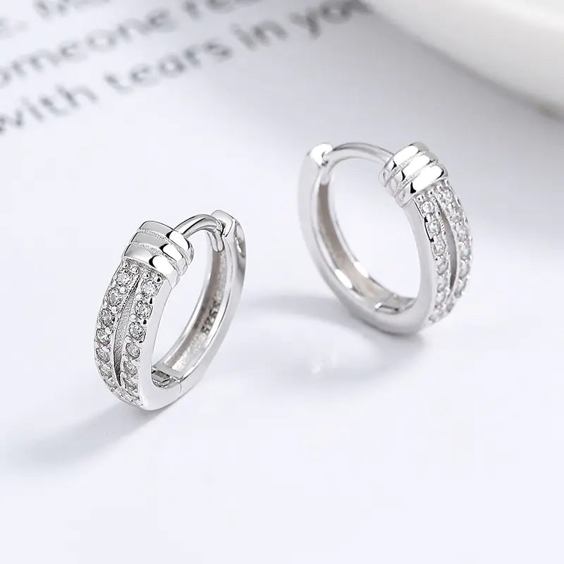 925 silver knot diamond earrings with a stylish, unique design featuring sparkling diamonds and intricate silver craftsmanship.