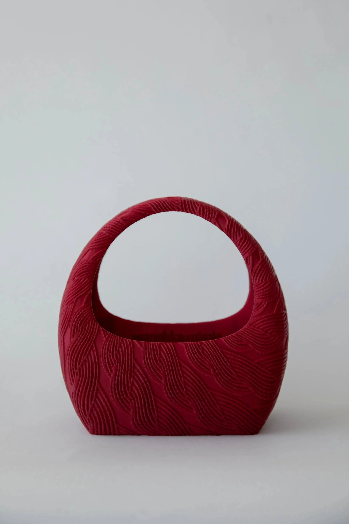 Marion 3D printed cable handbag by Plush Fashion Hub featuring sculptural, architectural design in a statement bag style.