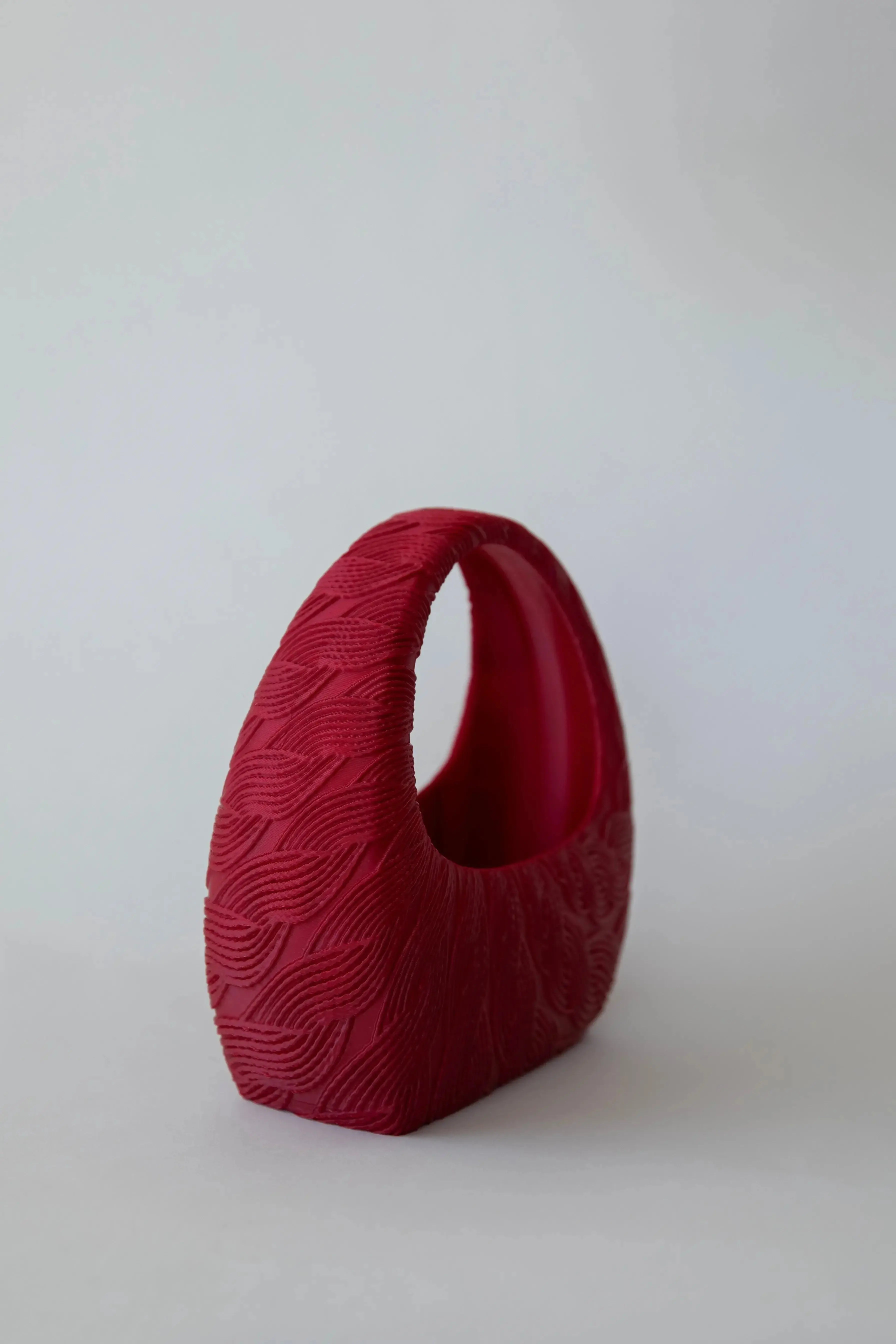 Marishka Marion 3D printed cable handbag with sculptural, architectural design, featuring intricate textured details.