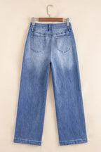 Light blue Megan loose high-rise jeans by Threaded Pear, showcasing relaxed fit and high waist style.