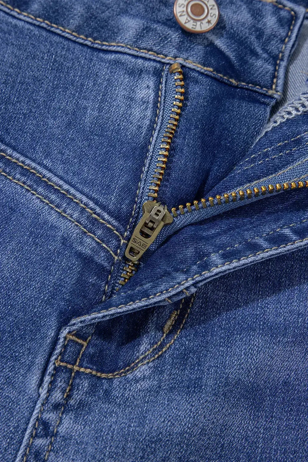 Light blue Megan loose high-rise jeans by Threaded Pear, showcasing relaxed fit and high waist with classic denim texture.