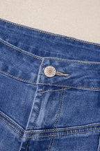 Light blue Megan loose high-rise jeans by Threaded Pear displayed on a model, showcasing relaxed fit and high waist.