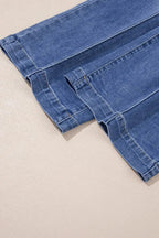 Light blue Megan loose high-rise jeans by Threaded Pear, showcasing relaxed fit and high waist on a mannequin.