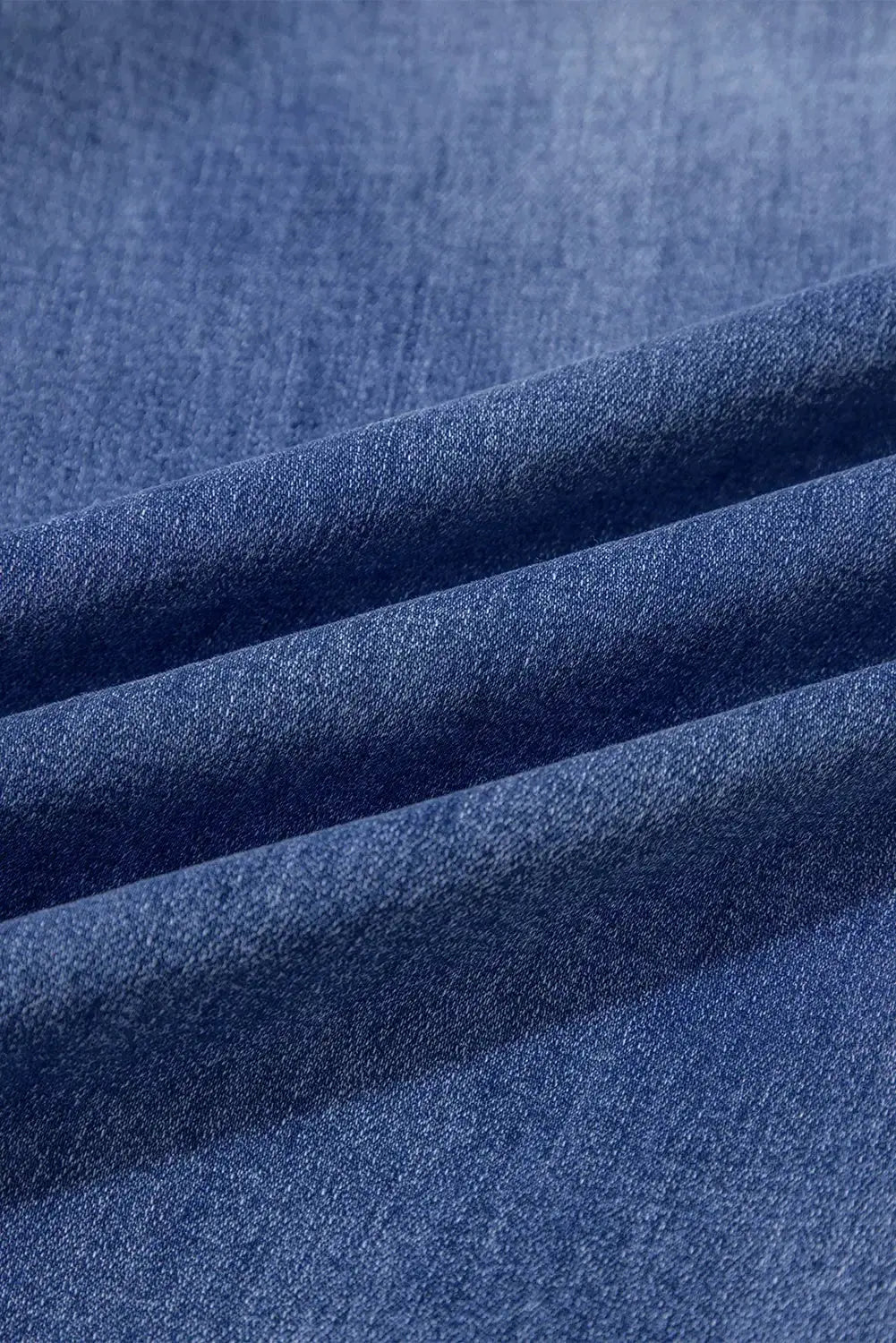 Light blue Megan loose high-rise jeans by Threaded Pear with a relaxed fit and classic denim texture.