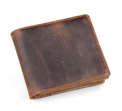 Men's luxury leather wallet with two-fold design and zipper compartment.