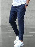 Men's slim fit casual drawstring trousers with pockets, lightweight pants by Plush Fashion Hub, stylish and comfortable for everyday wear.