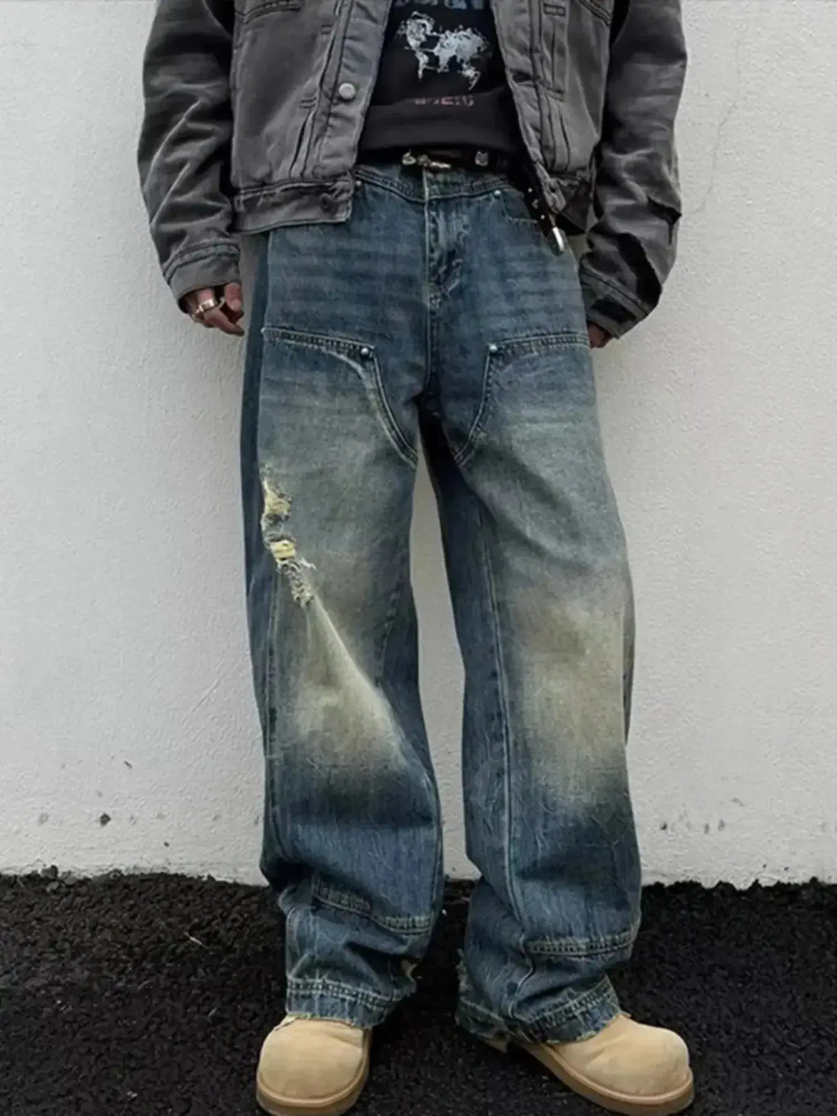 Men's distressed wide-leg jeans by Plush Fashion Hub, featuring a relaxed fit and casual denim style.