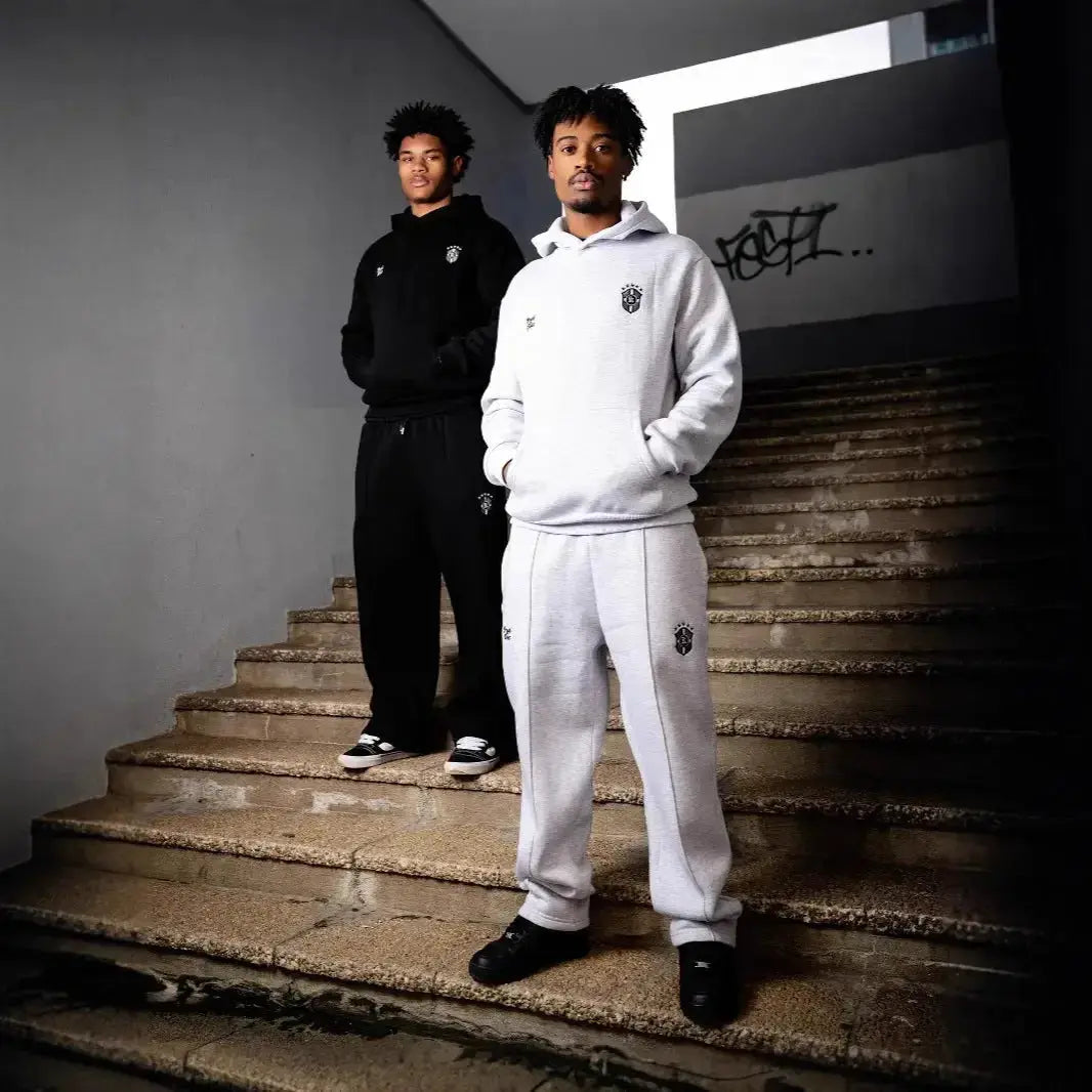 Men's casual hooded sweatshirt and jogger sweat suit set by Plush Fashion Hub, featuring a long-sleeve hoodie and matching sweatpants.