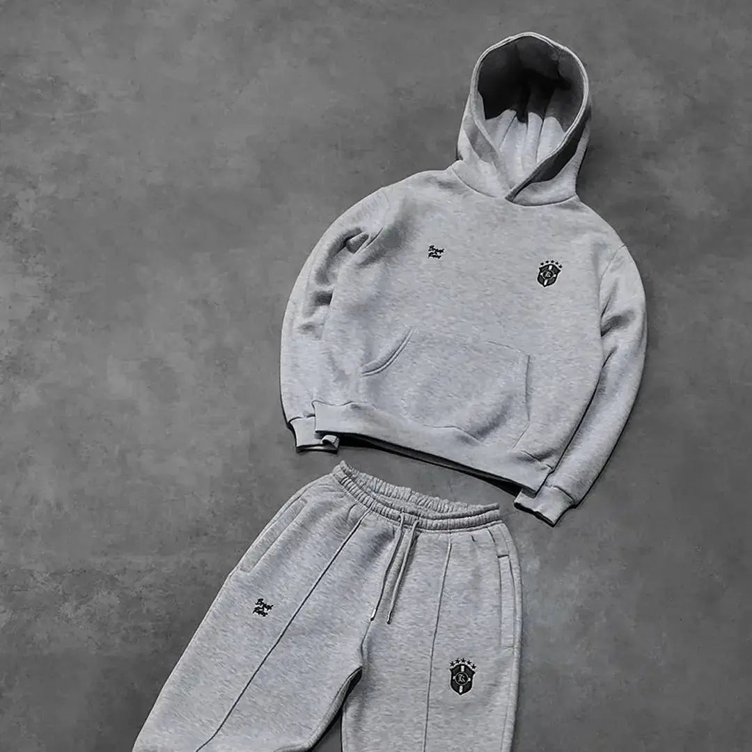 Men's plush fashion hub casual hooded sweatshirt and jogger tracksuit set, long-sleeve hoodie with matching sweatpants.