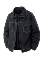 Men's plus size casual denim jacket with snap-down front, relaxed fit, oversized style, trendy outerwear by Trendsi.