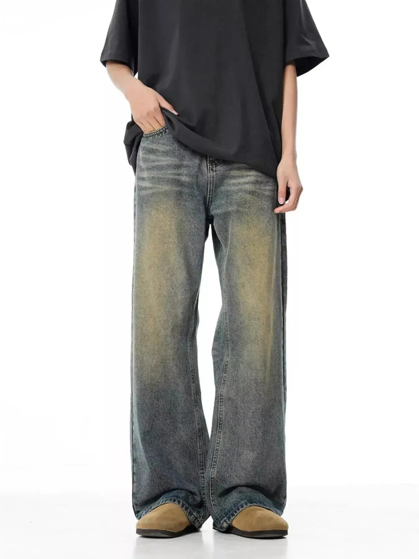 Men's vintage wash wide-leg relaxed fit denim jeans by Trendsi, showing the relaxed fit and classic denim texture.