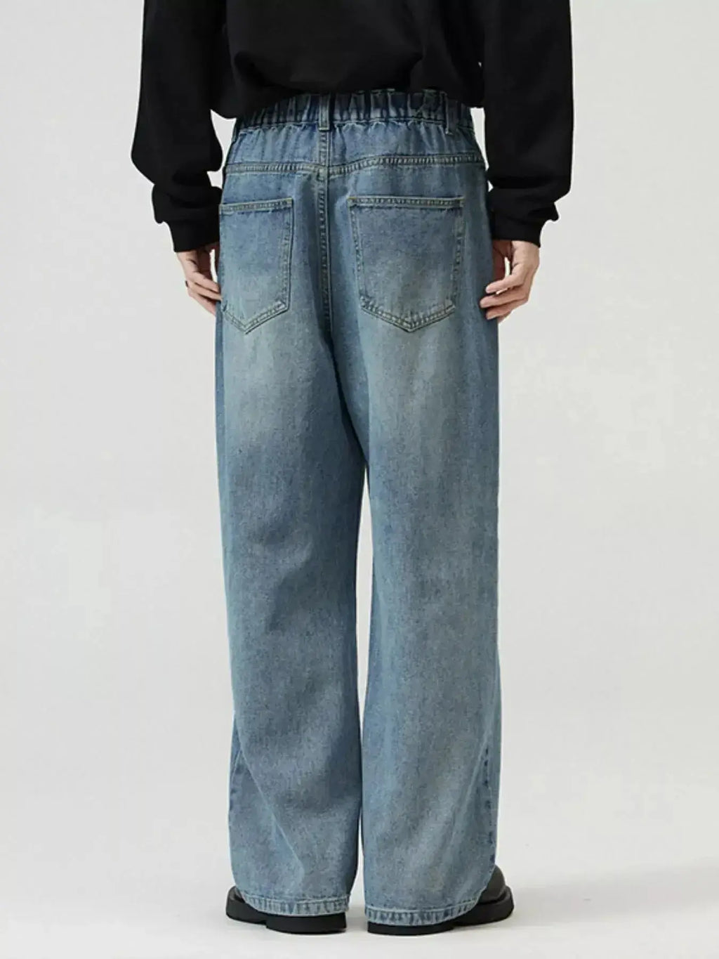 Men's washed straight-leg stretch jeans from Trendsi, featuring a comfortable fit and classic denim style.