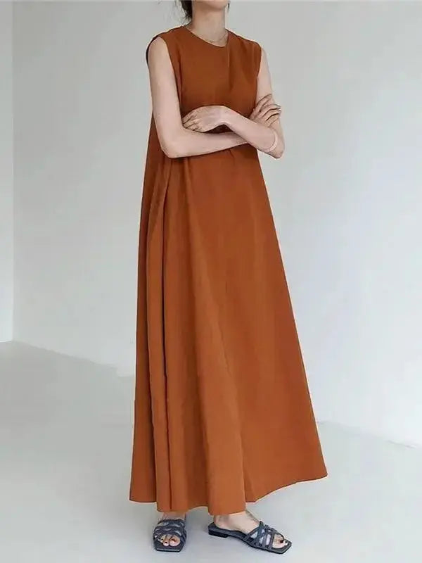 Minimalist beige sleeveless ramie cotton dress from Plush Fashion Hub, relaxed fit and breathable for casual summer wear.