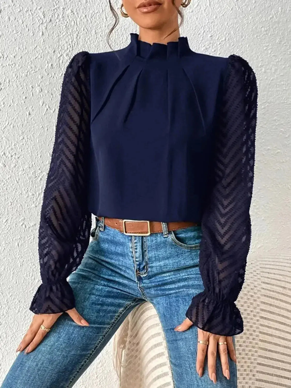 Elegant plush fashion hub mock neck blouse with flounce sleeves, featuring a stylish and sophisticated shirt design.