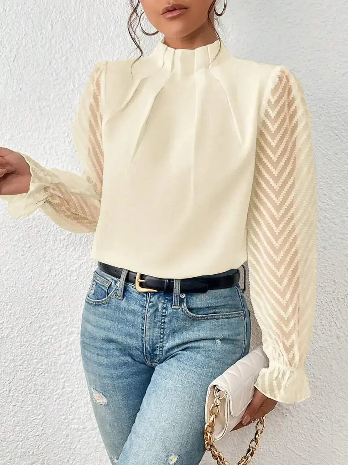 Elegant plush fashion hub mock neck blouse with flounce sleeves, featuring a stylish and sophisticated shirt design.