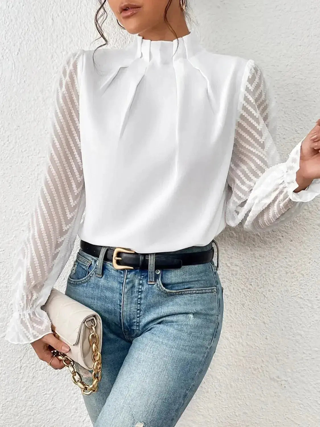 Elegant mock neck blouse with flounce sleeves from Plush Fashion Hub, shown on a mannequin with stylish detailing.