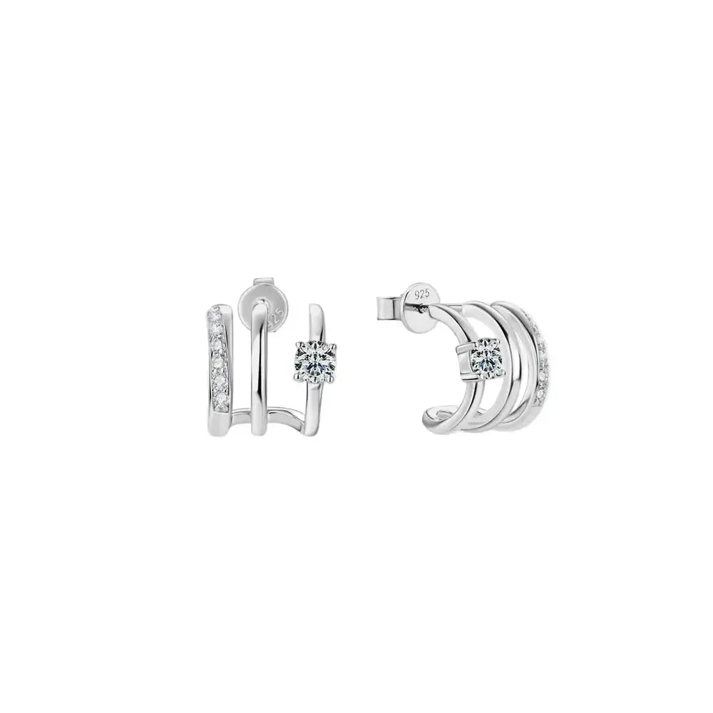 Sterling silver stud earrings with 0.84ct moissanite gemstones, from Plush Fashion Hub, showcasing sparkling jewelry design.