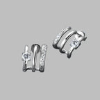 Sterling silver stud earrings with 0.84ct moissanite gemstones, elegant jewelry from Plush Fashion Hub.