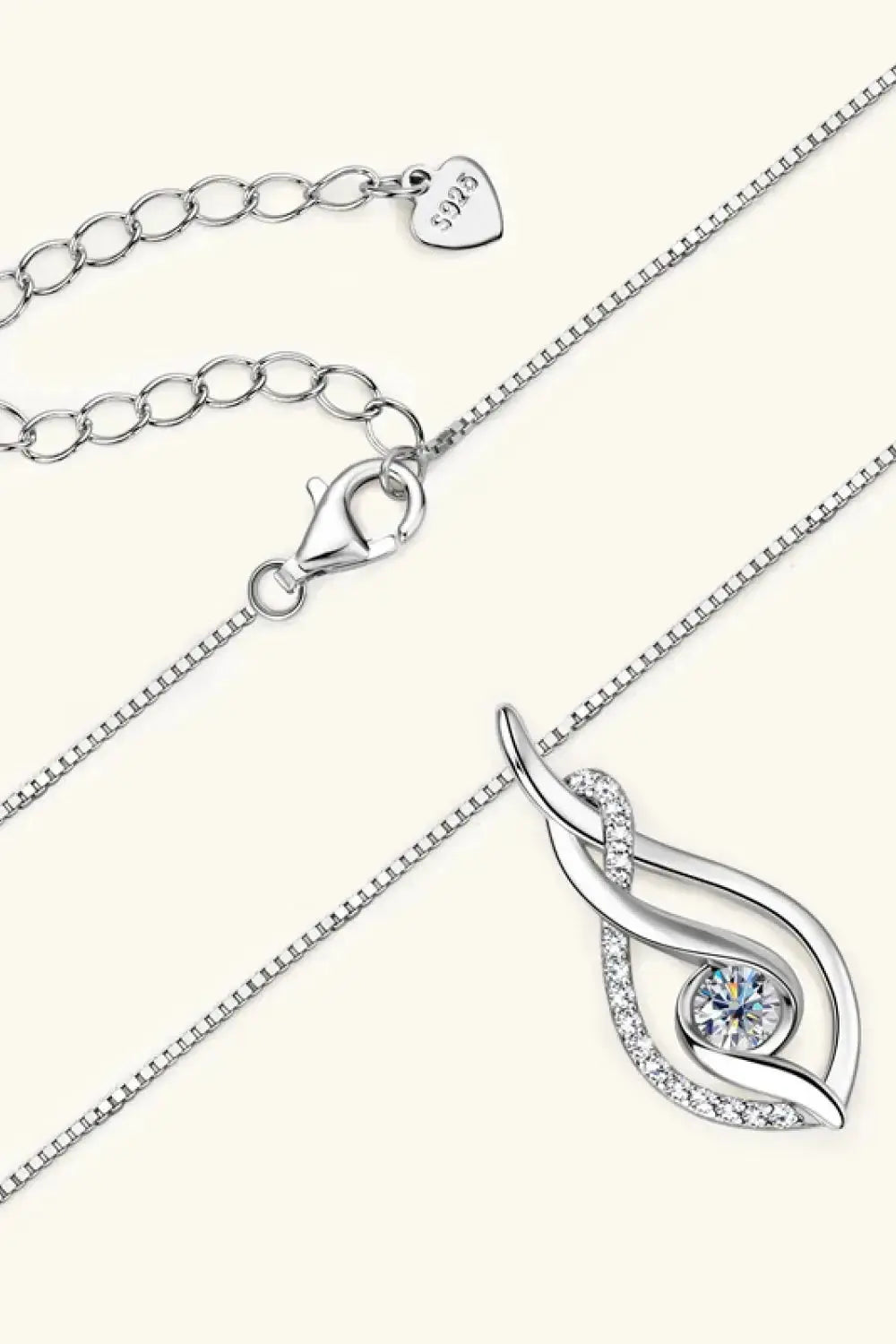 Sterling silver moissanite necklace with 18K gold accents, featuring a sparkling 0.3ct center stone for elegant jewelry.