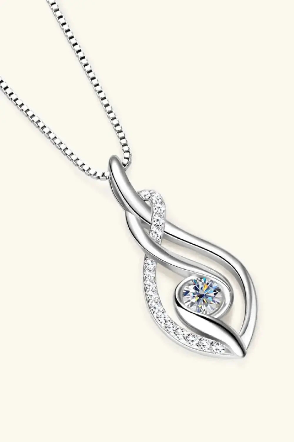 Moissanite 0.3ct necklace in sterling silver with 18K gold accents, featuring a sparkling pendant.
