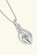 Moissanite 0.3ct necklace in sterling silver with 18K gold accents, featuring a sparkling pendant.