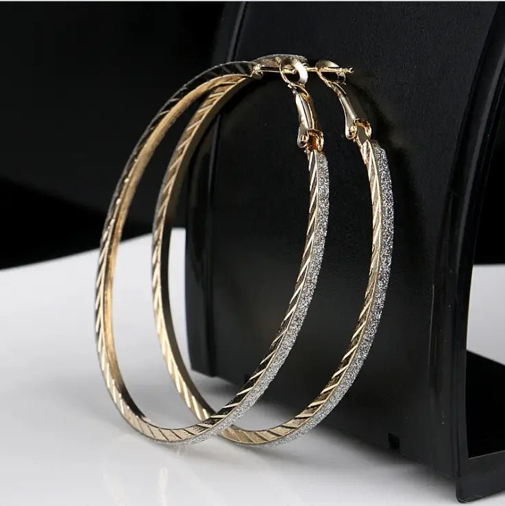 Modern multilayer forked circle earrings in two-tone gold and silver by Plush Fashion Hub, featuring layered geometric design.