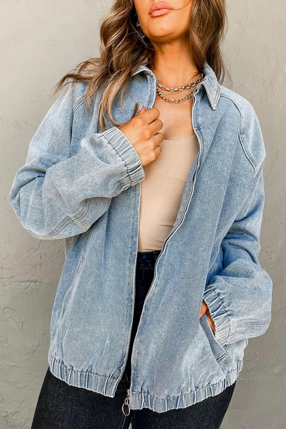 Plush Fashion Hub zip-up denim jacket with raglan sleeves and elastic hem, featuring classic blue denim and stylish fit.