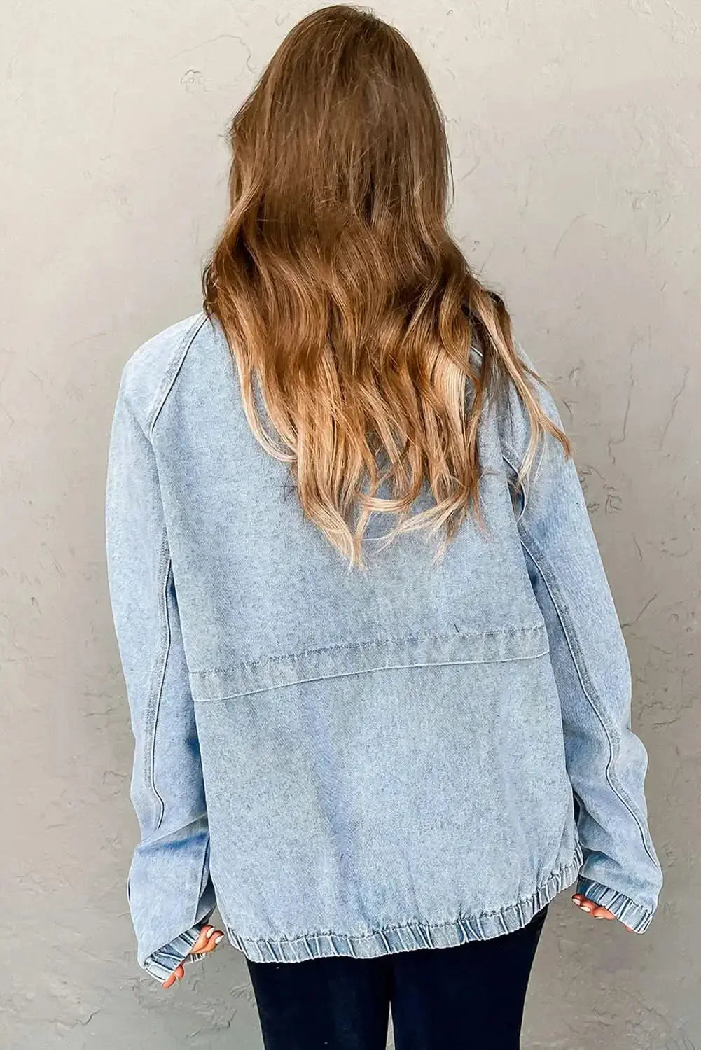 Plush Fashion Hub zip-up denim jacket with raglan sleeves and elastic hem, featuring classic blue denim and stylish design.