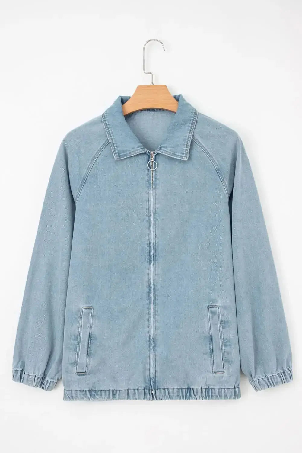 Zip-up denim jacket with raglan sleeves and elastic hem from Plush Fashion Hub, shown on a mannequin.