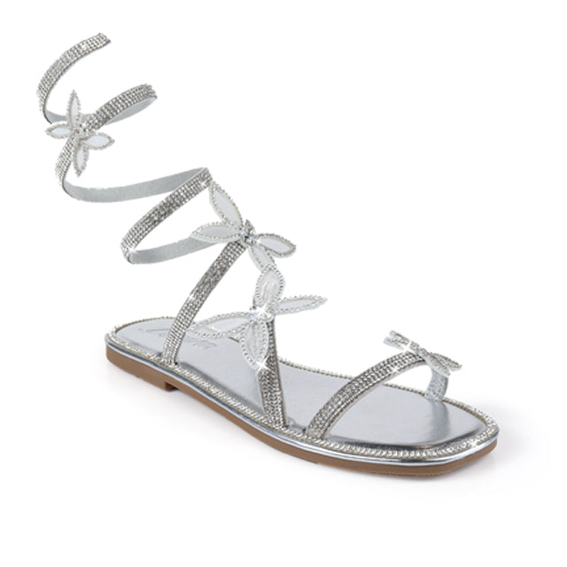 Silver Nancy-1 sandals by Plush Fashion Hub featuring stylish open-toe design and ankle straps, photographed from an angled side view.