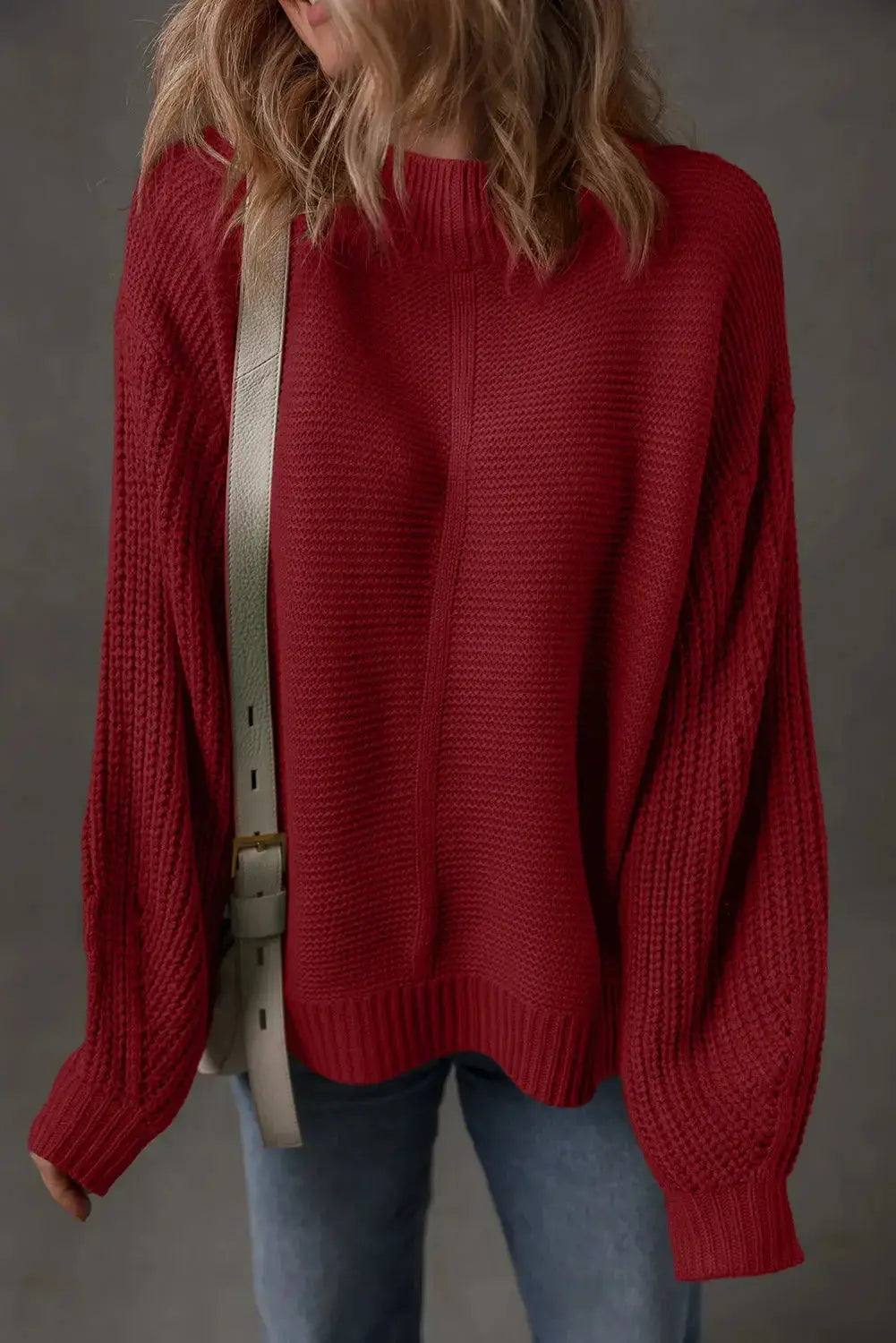 Cream-colored Natalia drop shoulder loose sweater by Threaded Pear, featuring a relaxed fit and soft knit fabric.