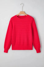 Nellie knit ribbed cuffs sweater by Threaded Pear featuring a cozy, textured knit design and ribbed sleeve cuffs.