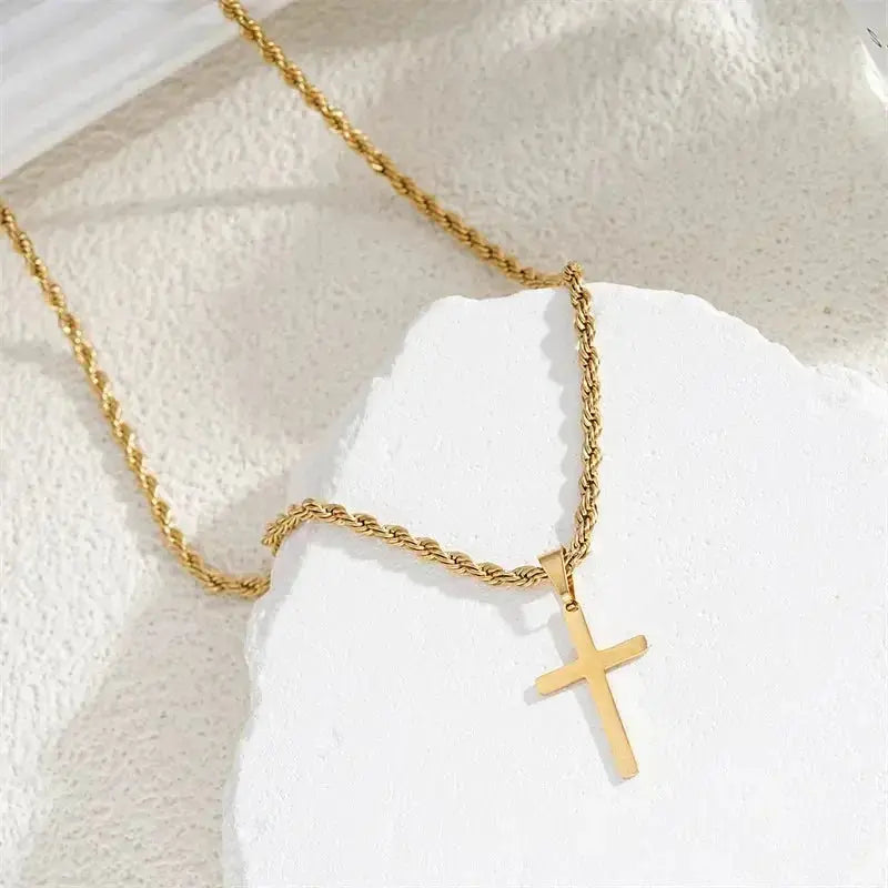 Minimalist gold cross pendant necklace for men and women, dainty unisex jewelry chain, stylish and simple accessory.