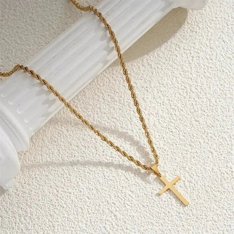 Minimalist gold cross pendant necklace for men and women, unisex jewelry from Plush Fashion Hub.