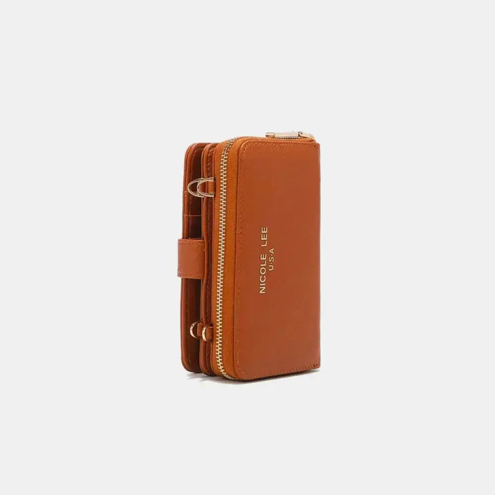 Vegan leather convertible 2-piece crossbody phone case and wallet by Plush Fashion Hub, featuring a sleek design and compact storage.
