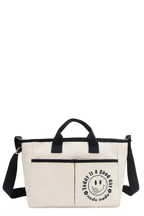 Artistic graphic print canvas tote bag by Plush Fashion Hub featuring bold Nicole-Lee USA design on durable fabric.