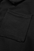 Nina waffle knit long sleeve top by Threaded Pear, shown in a cozy, textured fabric with a relaxed fit.