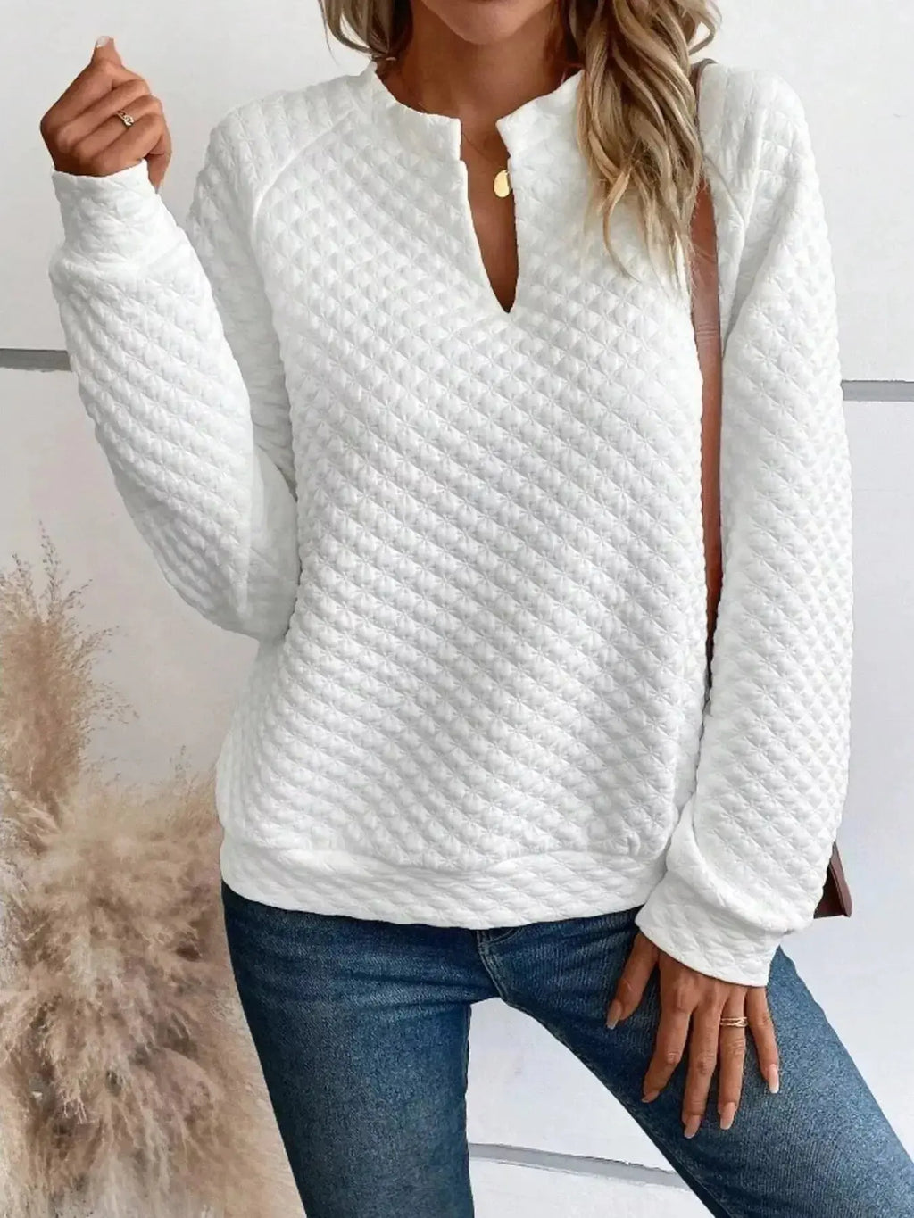 Soft textured women's raglan waffle-knit sweatshirt with notched sleeves by Plush Fashion Hub, casual pullover shirt for cozy comfort.