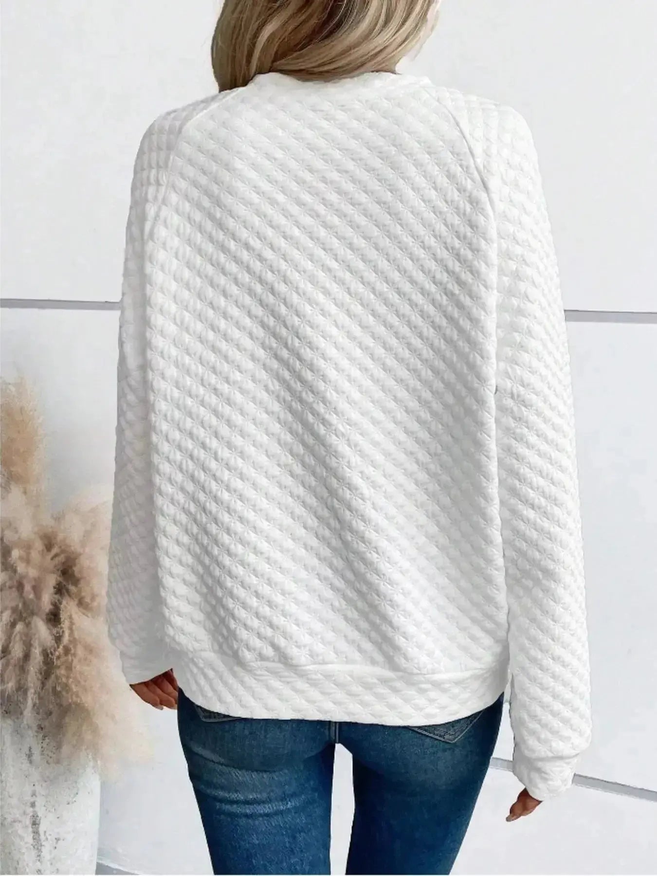 Women's notched raglan waffle-knit sweatshirt by Plush Fashion Hub, soft textured pullover with stylish raglan sleeves.