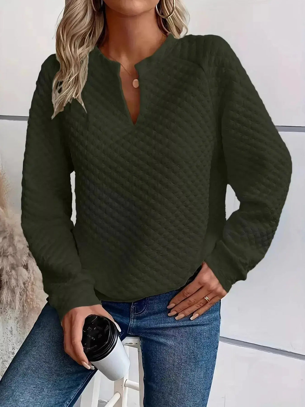 Women's notched raglan waffle-knit sweatshirt with soft textured fabric, stylish pullover by Plush Fashion Hub.