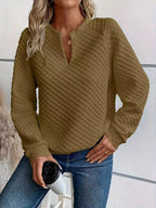 Women's plush fashion hub waffle-knit sweatshirt with notched raglan sleeves, soft textured pullover for casual wear