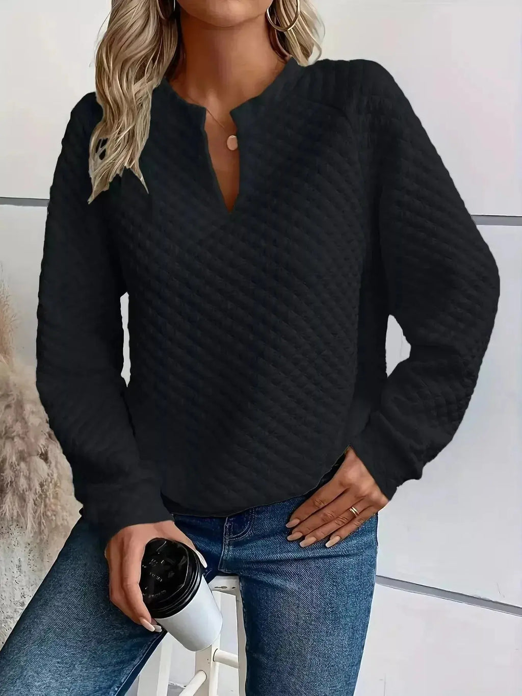 Women's notched raglan waffle-knit sweatshirt by Plush Fashion Hub featuring soft textured fabric and casual pullover style.