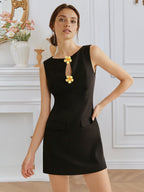 Women’s sleeveless dress by Plush Fashion Hub with rose front buttons, round neck, waist trimming, perfect for elegant occasions.