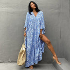 Printed long beach cover-up skirt from Plush Fashion Hub, featuring a flowy maxi dress style perfect for vacation and sun protection.