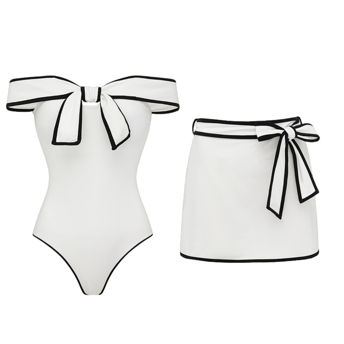 Black and white matching swimsuit bottoms with a sweet girl bow detail, featuring a white skirt, by Plush Fashion Hub.